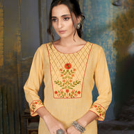 Laxmipati Cotton Polo Flex   Milky Yellow  Classy Straight Kurti With Simple Neck , While The Embroidery Detailed Bodice And Trims Add A Traditional Finishing Touch. Along With Pant