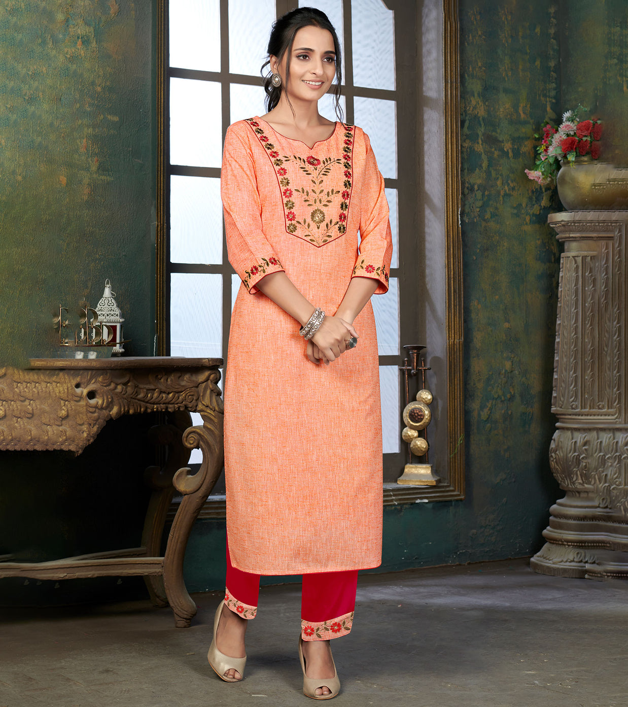 Laxmipati Cotton Polo Flex   Melon Orange Classy Straight Kurti With Simple Neck , While The Embroidery Detailed Bodice And Trims Add A Traditional Finishing Touch. Along With Pant