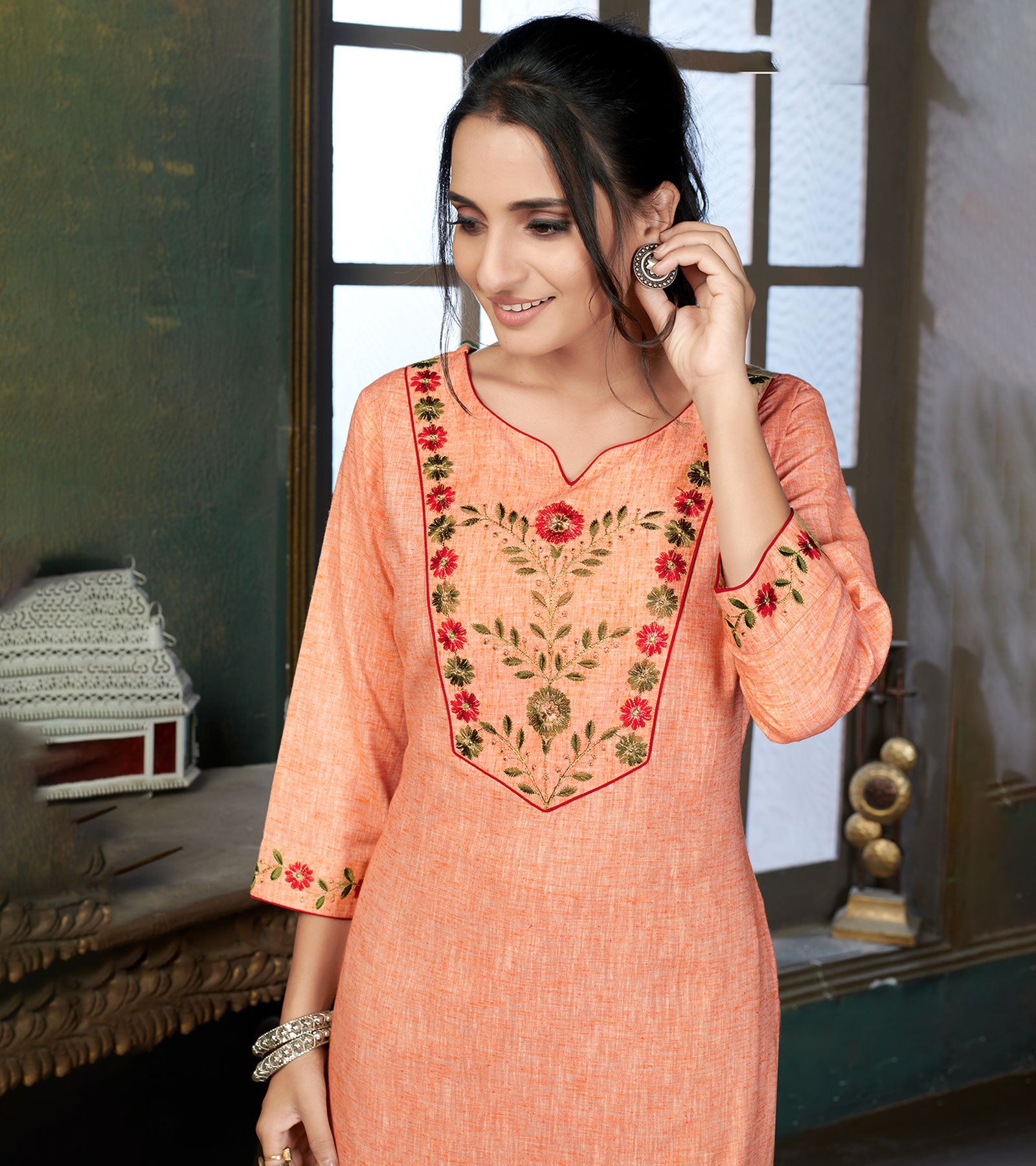 Laxmipati Cotton Polo Flex   Melon Orange Classy Straight Kurti With Simple Neck , While The Embroidery Detailed Bodice And Trims Add A Traditional Finishing Touch. Along With Pant