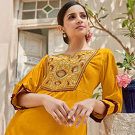 Laxmipati Muslin Antistic Yellow Straight Cut Kurti With Embroidered Work
